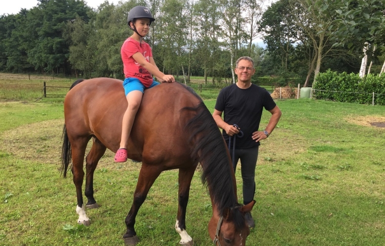 Vrijwilliger Willem Dijkstra met paard